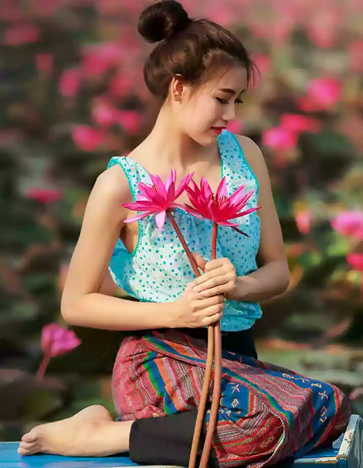 Girl taking water lily photos